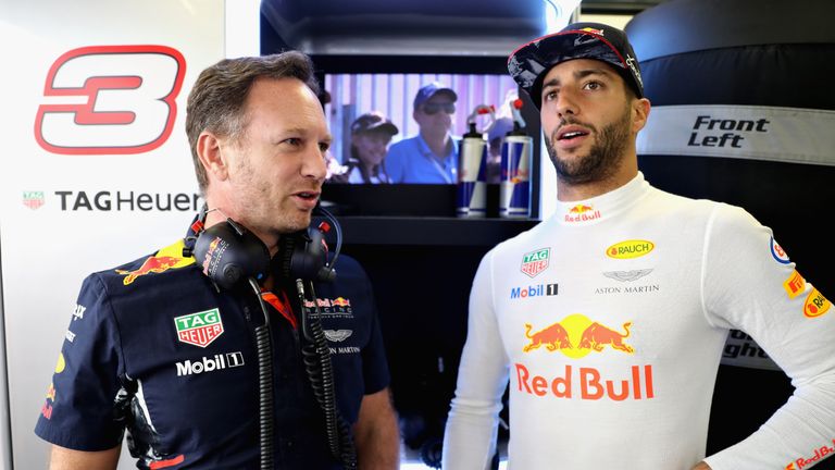 SOCHI, RUSSIA - APRIL 29:  Daniel Ricciardo of Australia and Red Bull Racing talks with Red Bull Racing Team Principal Christian Horner in the garage durin