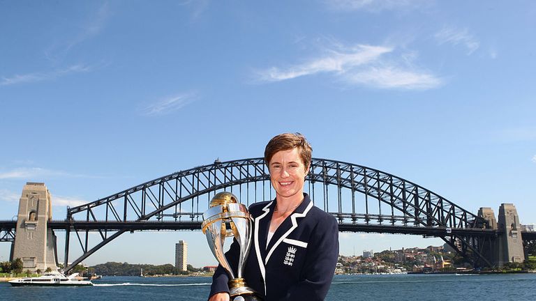 SYDNEY, AUSTRALIA - MARCH 23:  Player of the tournament Claire Taylor of England poses with the ICC Women's World Cup 2009 trophy at the Opera House overlo