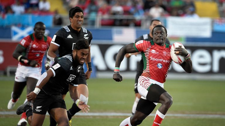 Collins Injera (R) of Kenya runs from Vilimoni Koroi of New Zealand during the USA Sevens tournament Rugby match Kenya vs New Zealand. mARCH 3 2017