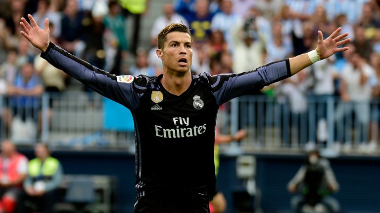 Cristiano Ronaldo celebrates after opening the scoring for Real Madrid at Malaga