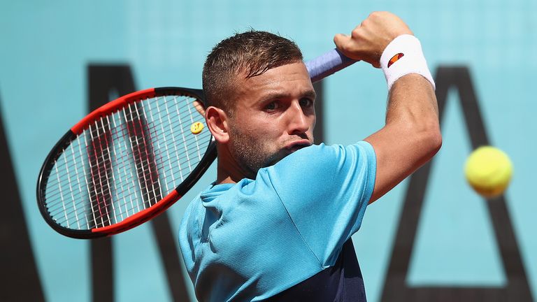 Dan Evans in action against Robin Haase on day three of the Mutua Madrid Open