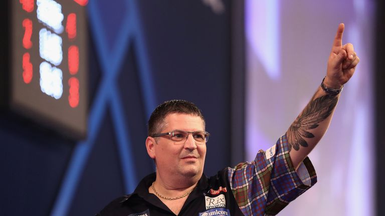 Gary Anderson celebrates beating Peter Wright in their PDC World Darts Championships semi-final at Alexandra Palace on January 1, 2017
