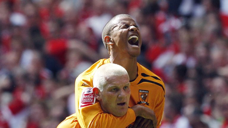 Hull City's Dean Windass (Bottom) celebrates scoring the opening goal with team-mate Frazier Campbell on May 24, 2008 during the Football League Championsh