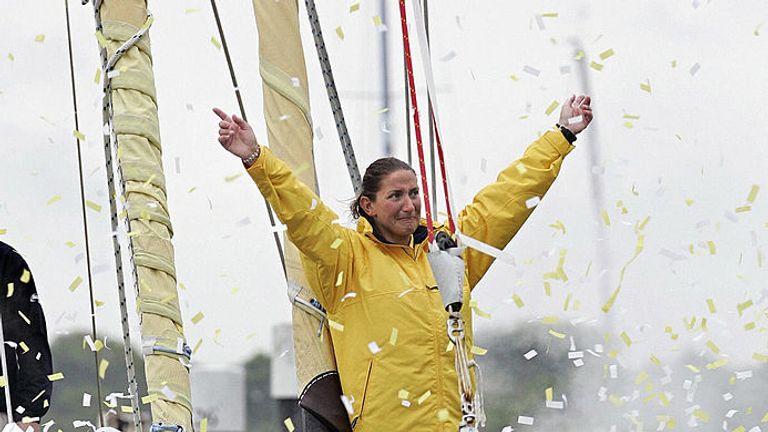  Southampton sailor Dee Caffari on the bow of her yacht Aviva, 21 May 2006, as she returns home to the city after an epic six months at sea