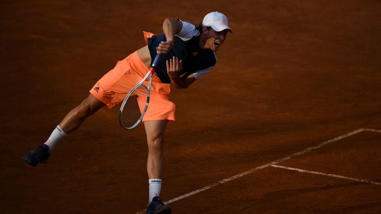 ROME, ITALY - MAY 17:  Dominic Thiem of Austria plays a shot during his second round match against Pablo Cuevas of Uruguay in The Internazionali BNL d'Ital