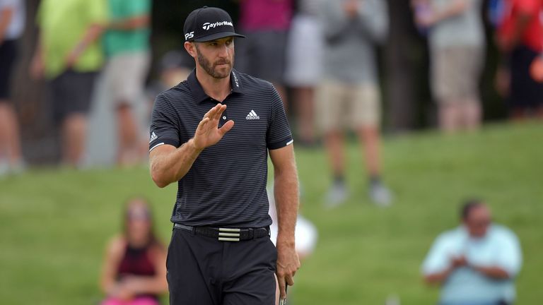 IRVING, TX - MAY 20:  Dustin Johnson reacts to a birdie putt on the fifth green during Round Three of the AT&T Byron Nelson at the TPC Four Seasons Resort 
