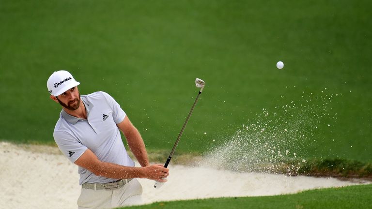 AUGUSTA, GA - APRIL 05:  Dustin Johnson of the United States plays a shot from a bunker on the tenth hole during a practice round prior to the start of the