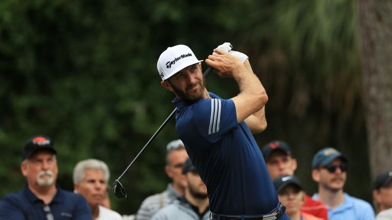 Dustin Johnson of the United States plays his shot from the second tee during the third round of THE PLAYERS Championship 