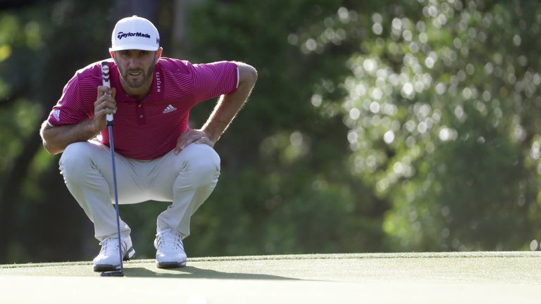 WILMINGTON, NC - MAY 4: Dustin Johnson lines up a putt on the tenth green during round one of the Wells Fargo Championship at Eagle Point Golf Club on May 