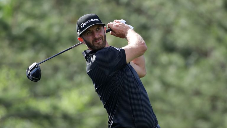 WILMINGTON, NC - MAY 5: Dustin Johnson plays his shot from the fourth tee during round two of the Wells Fargo Championship at Eagle Point Golf Club on May 