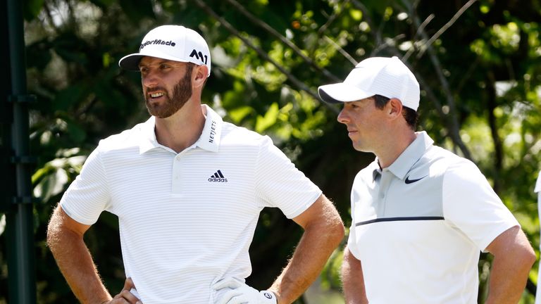 Dustin Johnson and Rory McIlroy during the first round of The Players Championship