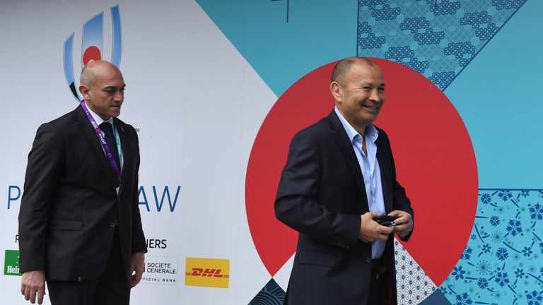 England's head coach Eddie Jones (R) a arrive at the Kyoto state guesthouse to attend the Rugby World Cup draw