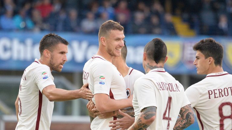 VERONA, ITALY - MAY 20:  Edin Dzeko  of  AS Roma celebrates after scoring  his team's fiveth goal during the Serie A match between AC ChievoVerona and AS R