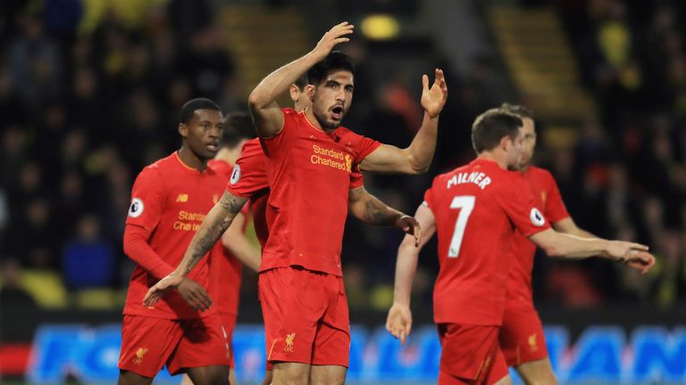 Emre Can celebrates after scoring the only goal at Vicarage Road
