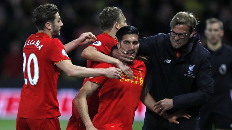 Liverpool's German midfielder Emre Can (C) celebrates with Liverpool's English midfielder Adam Lallana (L), Liverpool's Brazilian midfielder Lucas Leiva (2