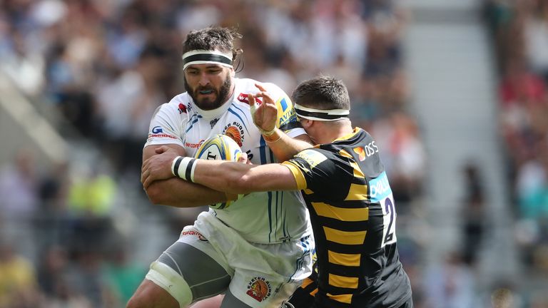 Don Armand of Exeter Chiefs is tackled by Wasps' Guy Thompson during the Aviva Premiership final