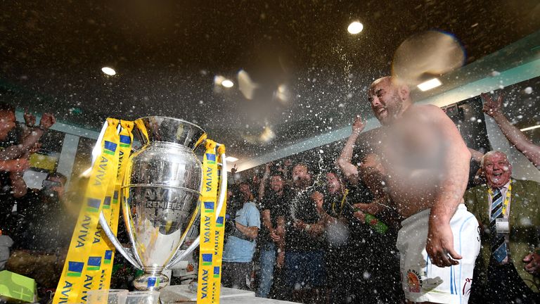 Shaun Malton of Exeter Chiefs leads the celebrations in the changing room