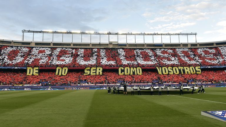 Atletico fans created a mosaic to take aim at their city rivals, which read "Proud to not be like you" 