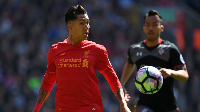 Liverpool's Brazilian midfielder Roberto Firmino watches the ball during the English Premier League football match between Liverpool and Southampton at Anf