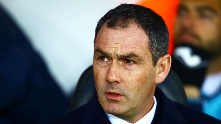 Paul Clement awaits kick-off in the Premier League match between Swansea and Tottenham at The Liberty Stadium