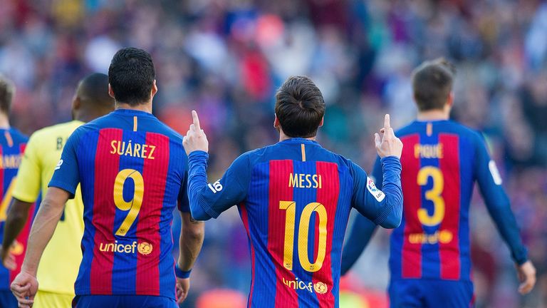 Lionel Messi celebrates after scoring Barcelona's second