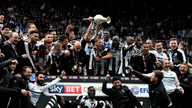 Newcastle United lift the Sky Bet Championship Trophy - Credit: Robbie Stephenson/Sky Bet