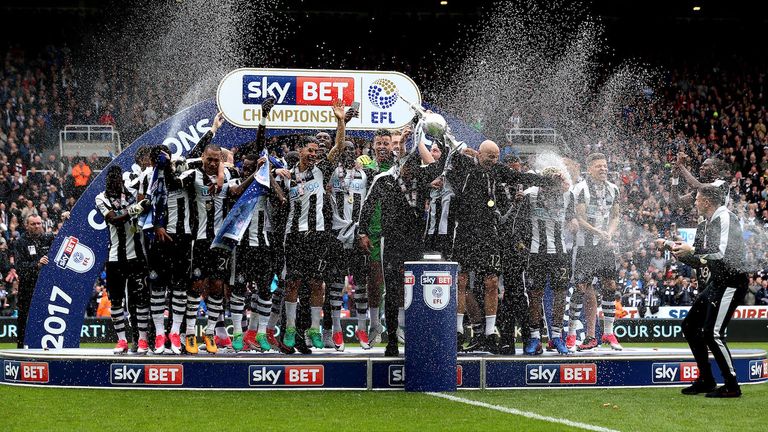 Cue the champagne as Newcastle United returned  to the Premier League at the first time of asking - Credit: Robbie Stephenson/Sky Bet