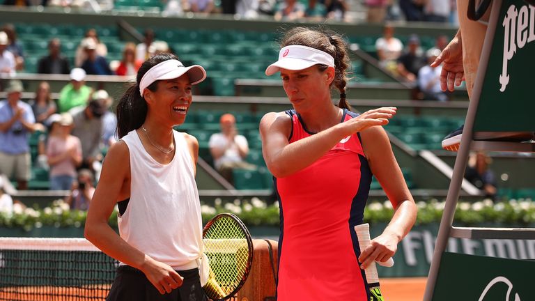 Johanna Konta of Great Britain and Su-Wei Hsieh of Taipei walk off court following the first round match on day three of the 2017 