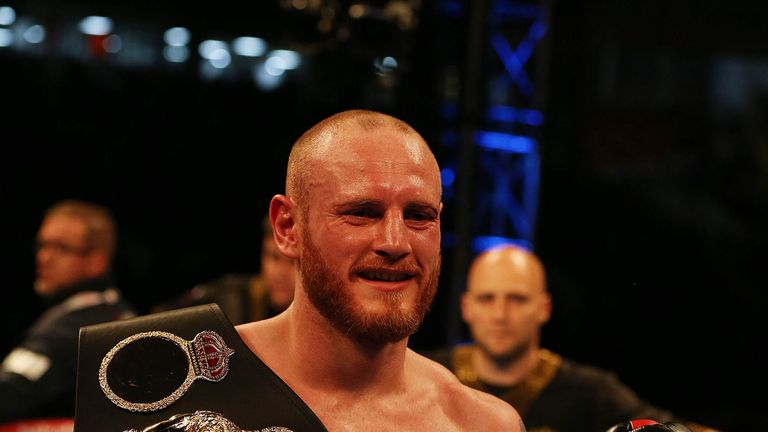 George Groves celebrates after beating Fedor Chudinov