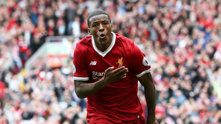 Georginio Wijnaldum celebrates his opening goal at Anfield