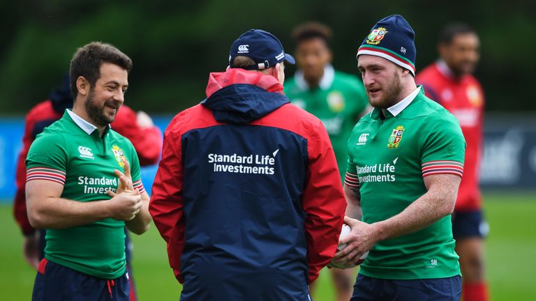 Greig Laidlaw (L) and Stuart Hogg (R) speak to British & Irish Lions kicking coach Neil Jenkins