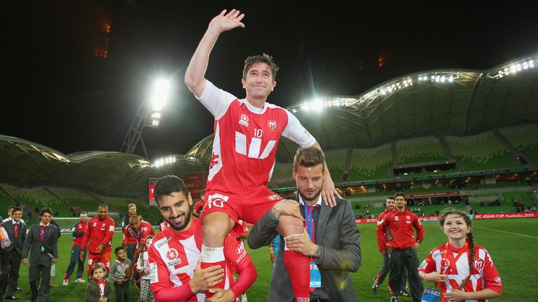 MELBOURNE, AUSTRALIA - APRIL 12:  Harry Kewell of the Heart is chaired off the field after playing his final match and retiring from football during the ro