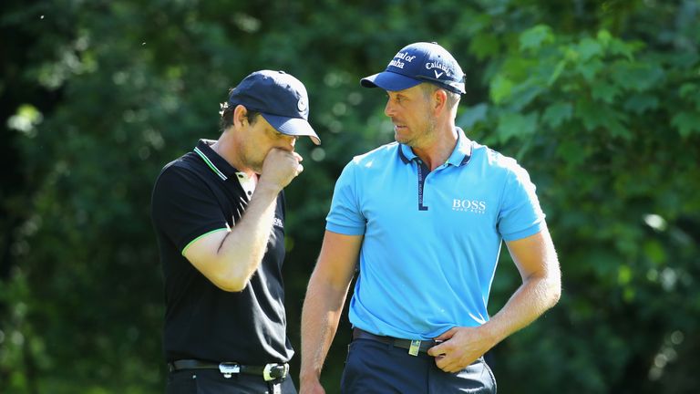 VIRGINIA WATER, ENGLAND - MAY 24:  Henrik Stenson of Sewden speaks with Dougray Scott on the 5th during the BMW PGA Championship Pro-AM at Wentworth on May