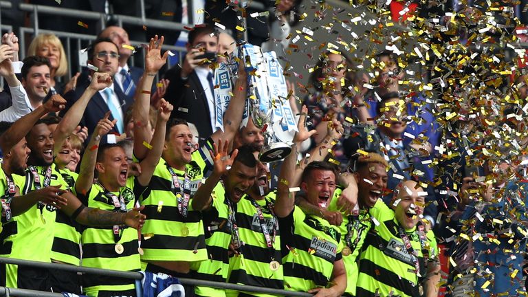 LONDON, ENGLAND - MAY 29:  Huddersield Town players celebrates promotion to the Premier League after the Sky Bet Championship play off final between Hudder