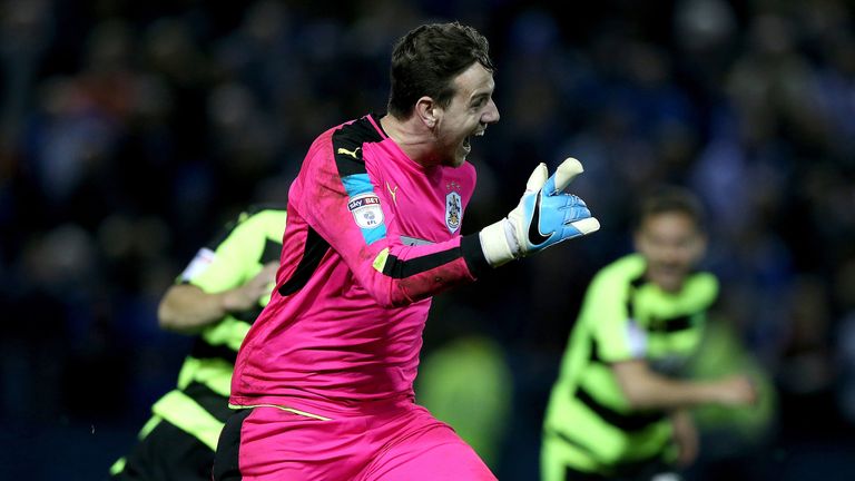 Danny Ward celebrates after he saved the final penalty