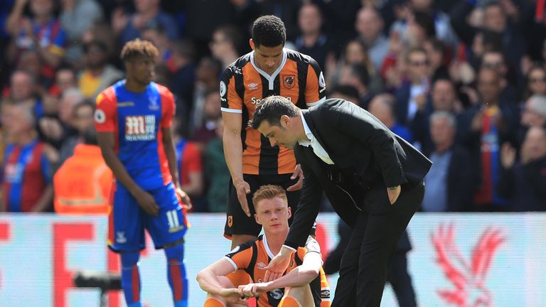 Curtis Davies and Marco Silva console Sam Clucas 