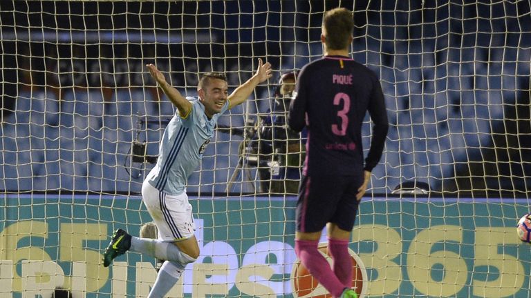 Celta Vigo's forward Iago Aspas celebrates after scoring a goal during the Spanish league football match RC Celta de Vigo vs FC Barcelona at the Balaidos s