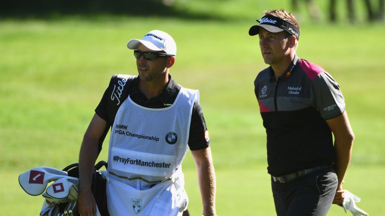 VIRGINIA WATER, ENGLAND - MAY 26:  Ian Poulter of England and his caddie James Walton look on during day two of the BMW PGA Championship at Wentworth on Ma