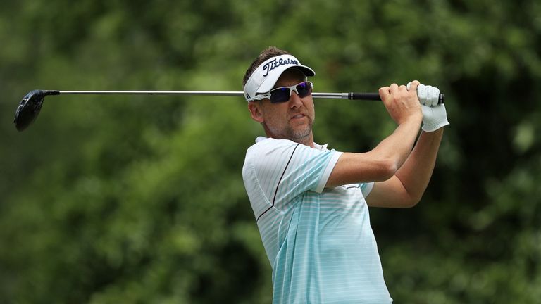 Ian Poulter of England plays his shot from the second tee during the third round of The Players Championship 