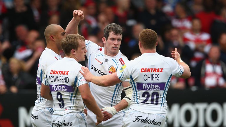 GLOUCESTER, ENGLAND - MAY 06 2017: Ian Whitten of Exeter Chiefs (2nd R) celebrates scoring a try against Gloucester with his team mates 