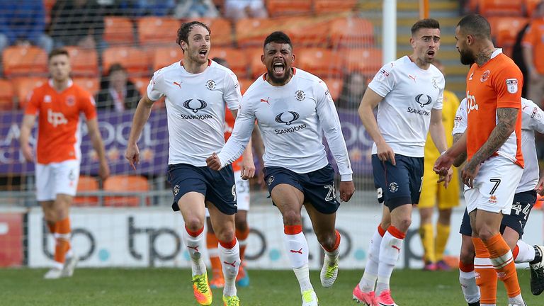 Luton Town's Isaac Vassell (second left) celebrates scoring his teams second goal against Blackpool, during the Sky Bet League Two Play Off, First Leg matc