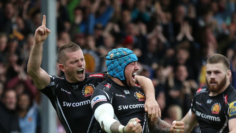 EXETER, ENGLAND - MAY 20:  Jack Nowell (scrum hat) of Exeter Chiefs celebrates with teammate Gareth Steenson (L) after scoring the opening try during the A