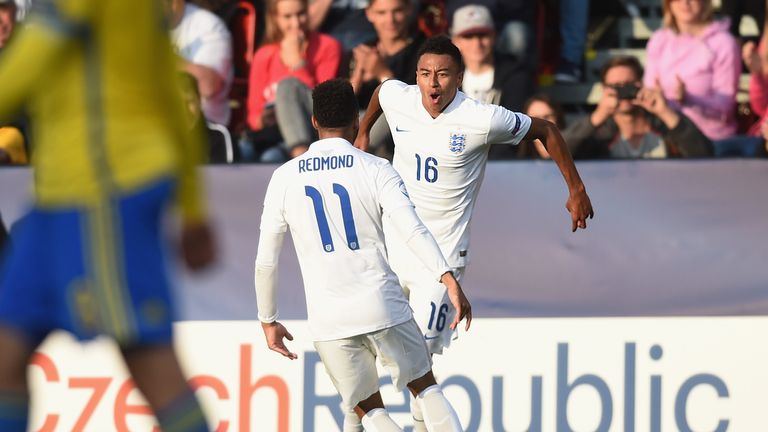 Jesse Lingard celebrates scoring against Sweden in the 2015 tournament