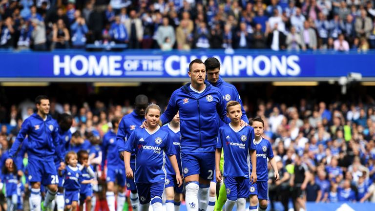 John Terry of Chelsea  leads his team out prior to the Premier League match between Chelsea and Sunderland at Stamford Bridge on May 21