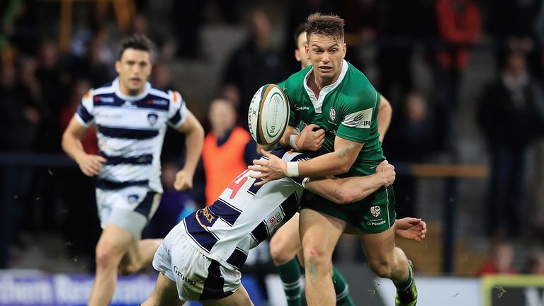 Alex Lewington of London Irish loses the ball in the tackle from Jonah Holmes of Leeds Carnegie during the Greene King IPA Champi