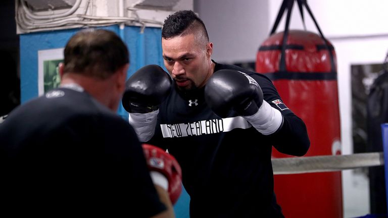 Joseph Parker spars with his trainer Kevin Barry during a training session in Auckland