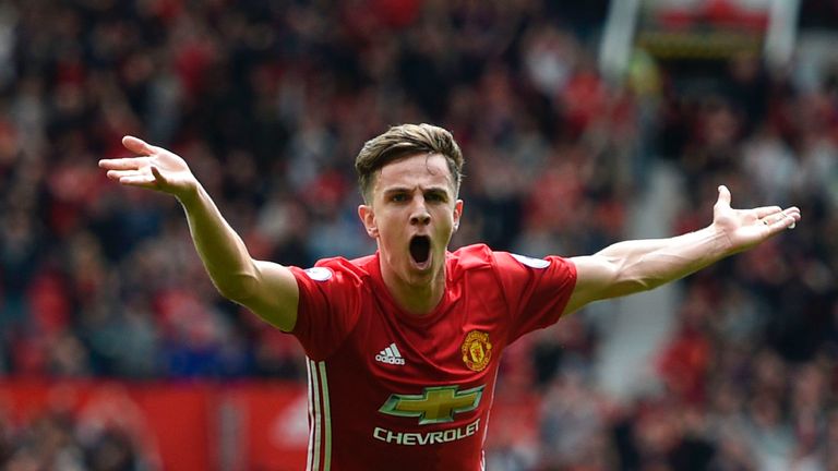Manchester United's English midfielder Josh Harrop celebrates scoring the opening goal during the English Premier League football match between Manchester 