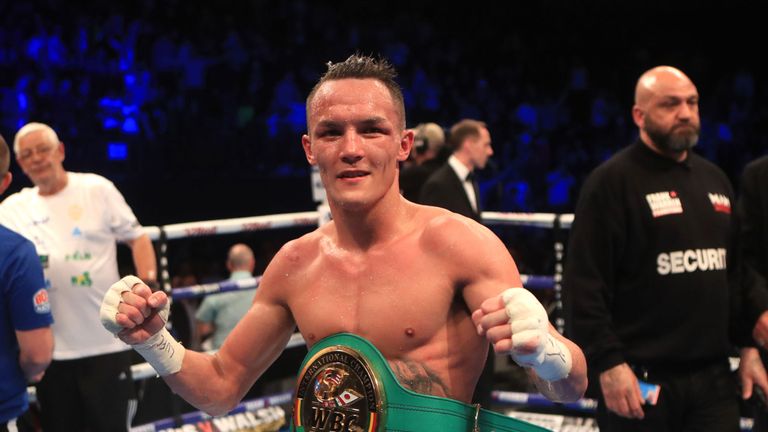 Josh Warrington celebrates beating Kiko Martinez