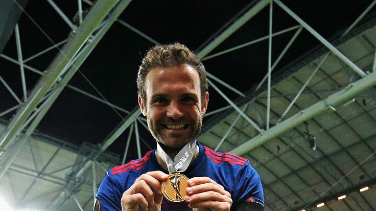 Juan Mata hopes the Europa League win helped lift the people of Manchester 
