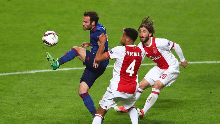 STOCKHOLM, SWEDEN - MAY 24: Juan Mata of Manchester United controls the ball while under pressure from Jairo Riedewald of Ajax and Lasse Schone of Ajax  du